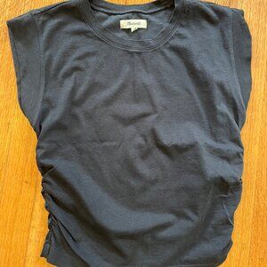 Cropped black shirt, ruched sides, cap sleeve.